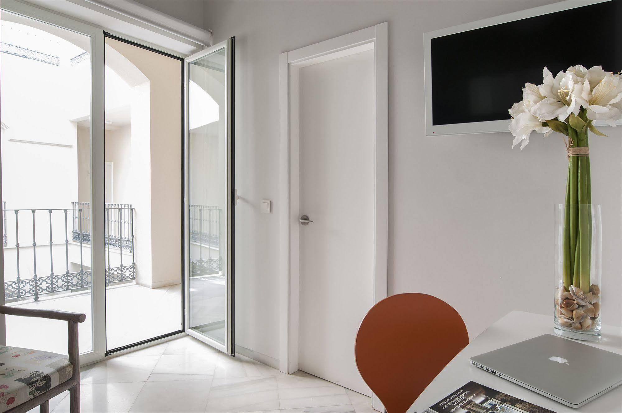 Suites Sevilla Plaza Bagian luar foto
